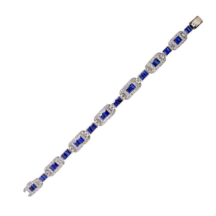Art Deco sapphire and diamond graduated oblong link bracelet, centred by a line of rectangular cut sapphire duos,
